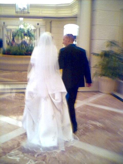 A bride and groom; Actual size=180 pixels wide